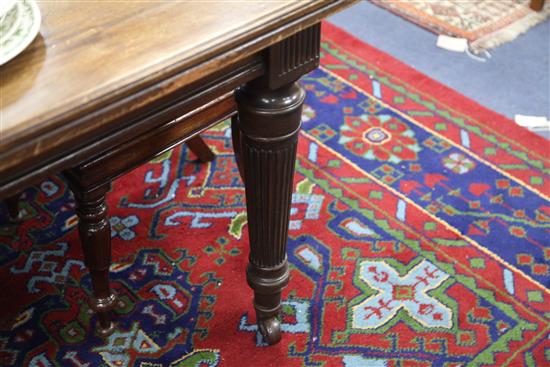 An Edwardian extending dining table extends to 240cm.